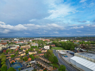 Obraz premium Aerial View of Buildings at Greater Manchester Central City, Northwest of England, United Kingdom. Aerial View Footage Was Captured with Drone's Camera on May 4th, 2024 During Sunset Time.