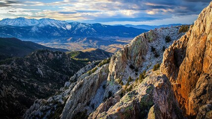 Fototapeta premium Conquering the Heights: Aerial View of Climbers on Dramatic Mountain Ridge with Vast Valleys Below