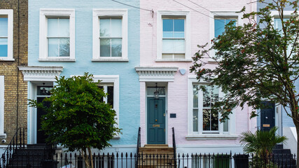 Pastel-colored houses standing side by side