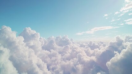 Fototapeta premium Heavenly Skyscape: Fluffy Cumulus Clouds in Bright Blue Sky - Uplifting and Cheerful Nature Scene