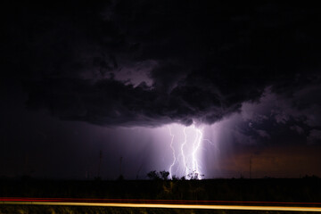 Thunderstorm at night over the desert