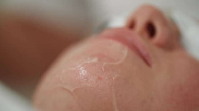 A cosmetologist performs the Lumecca procedure for cleansing the skin of the face. Self-care and beauty procedures in a cosmetology clinic. High quality 4k footage