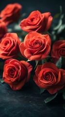 Obraz premium A bouquet of vivid red roses.