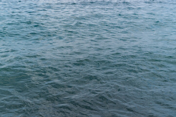 Obraz premium Water blue sea. Lake wave surface. Ocean texture abstract. Waves ripple reflection sunset.