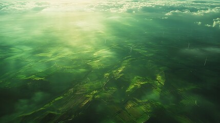 Fototapeta premium Sweeping aerial view of wind turbines on a vast expanse of farmland, rows of green crops extending to the horizon, sunlight reflecting off the blades, gentle movement in the fields below,