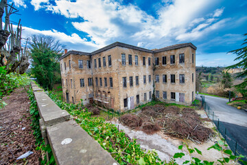 Fototapeta premium Haunting Images of Volterra's Abandoned Asylum: A Ghostly Glimpse into Its Dark Past