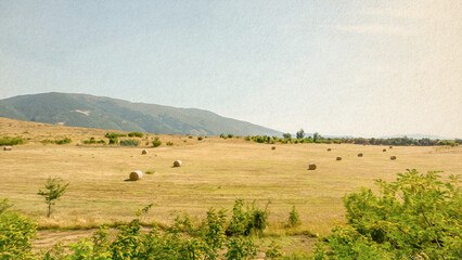 Obraz premium summer landscape view of mountain, blue sky, dry grass field with bales, digitally painted photo