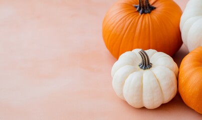 A vibrant autumn-themed composition featuring a sliced pumpkin on an orange background, emphasizing seasonal warmth and minimalistic design with a touch of greenery.