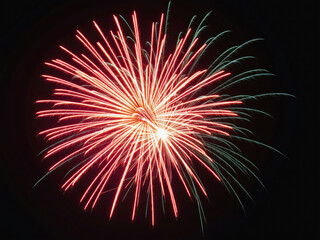 Fototapeta premium Colorful fireworks exploding in the night sky creating a stunning display