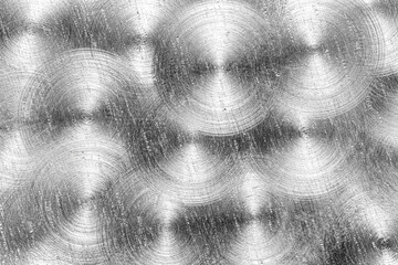 Stainless steel or aluminium circular brushed scratched shiny metal texture. Abstract metallic...