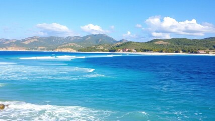 Fototapeta premium Soft, gentle ocean waves lapping onto a pristine sandy beach, idyllic, landscape