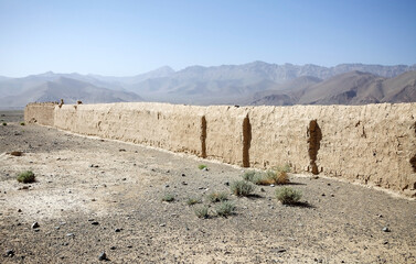 Boundary wall of the Old Graveyard in Murghab in the Pamir Mountains of Gorno-Badakhshan region in...