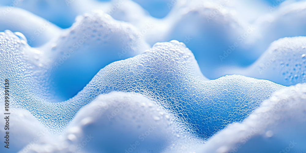 Poster the image is of a foam-like substance with a blue hue