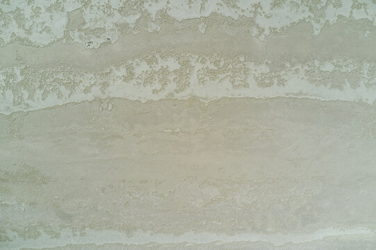 Crusty textures on the surface on a dry salt lake in Western Australia.