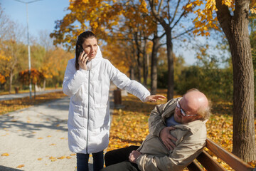 Woman calls for help as elderly man suffers heart crisis in park