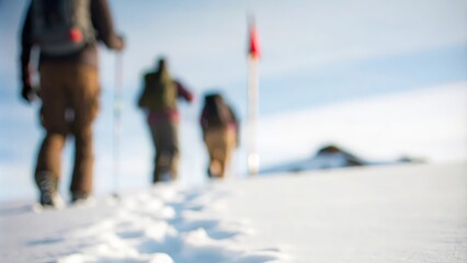An abstract blur of a hiker&rsquo;s footsteps leading to a defined flag.
