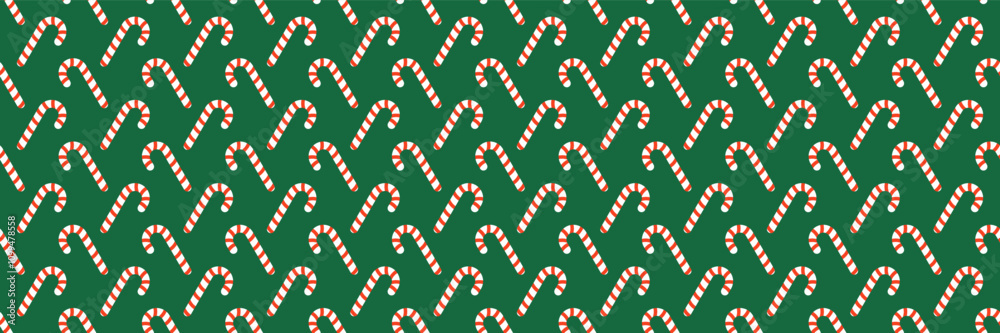 Poster horizontal red and white candy cane on green for pattern and background.