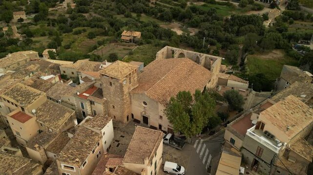 Parish church of Estellencs, Mallorca, Spain. Mallorca, Spain. Aerial footage.