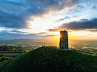Sunrise over Glastonbury Tor from a drone at autumn, Glastonbury, Somerset, England © Maciej Olszewski