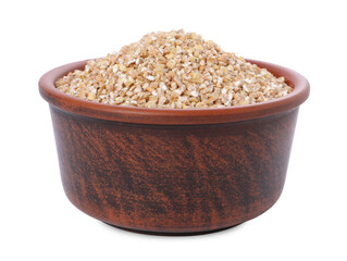 Dry wheat groats in bowl isolated on white