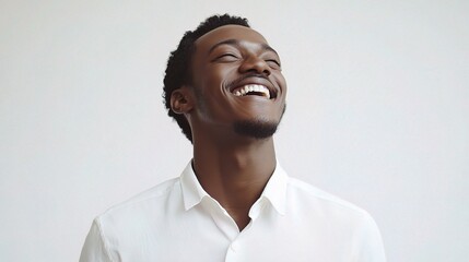 Obraz premium Happy Dark-Skinned Male Smiling Portrait in Bright Environment