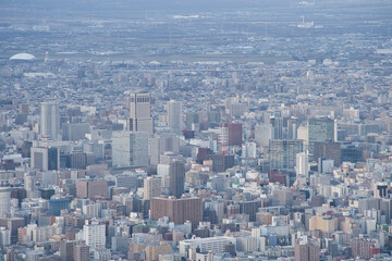 Obraz premium 札幌藻岩山山頂展望台からみた札幌のビル群の街並み