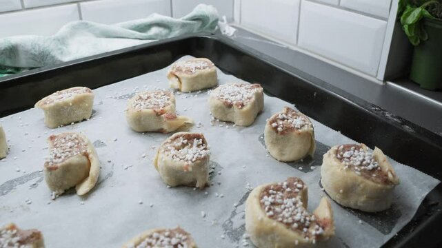 Push back with suger coated raw cinnamon buns