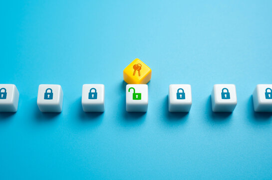 Selecting keys to open a padlock. Concept of solving the problem with the right tools. Finding a way to open access. Reveal secrets and mysteries. Search for truth.