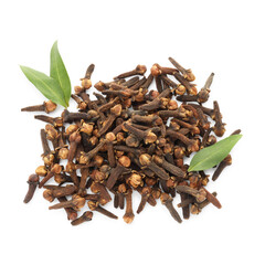 Obraz premium Dry clove buds and green leaves on white background, top view. Aromatic spice