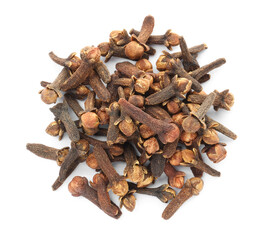 Obraz premium Pile of dry clove buds on white background, top view. Aromatic spice