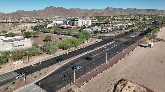 Aerial view of beautiful suburban landscape with modern buildings and intersecting roads, Verrado, Buckeye, Arizona, United States.