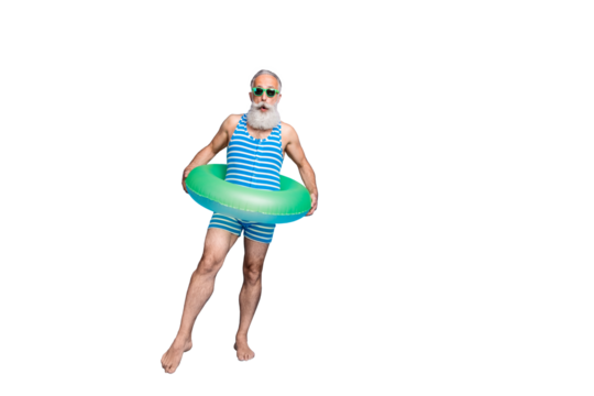 Full size photo of impressed man in eyeglasses eyewear wearing striped bathing costume hold lifesaver trying ocean water isolated over blue background