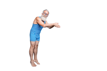 Full size photo of concentrated man jumping into ocean with equipment wearing striped bathing suit isolated over blue background