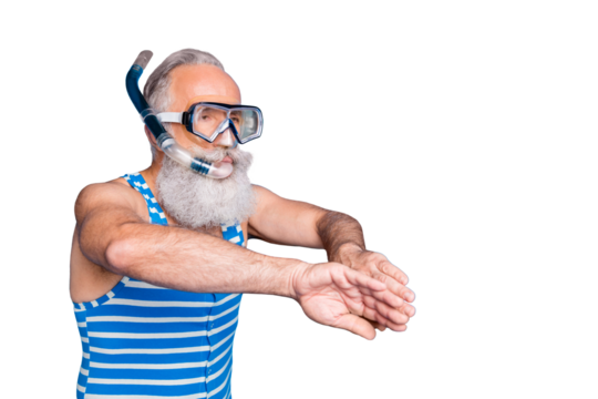 Portrait of retired pensioner swimming breaststroke with snorkel gear wearing striped costume isolated over blue background
