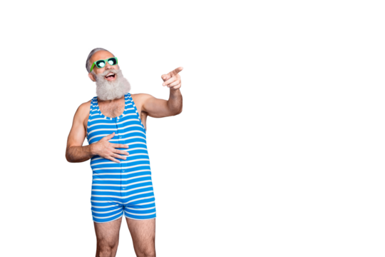 Portrait of nice attractive funky cheerful cheery glad gray-haired man pointing at funny thing news laughing joke fool 1 April isolated over bright vivid shine blue background - Powered by Adobe