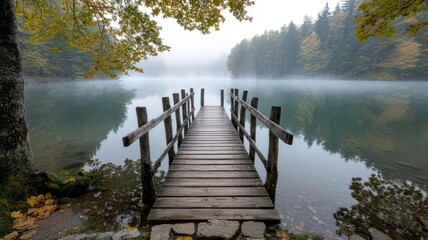 Obraz premium Cottage with a rustic wooden dock leading out onto a misty lake, with soft morning light streaming through the trees wooden dock, misty lake morning