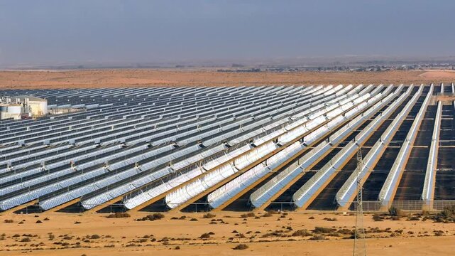 Parabolic Solar thermal collectors solar panels farm, Aerial view