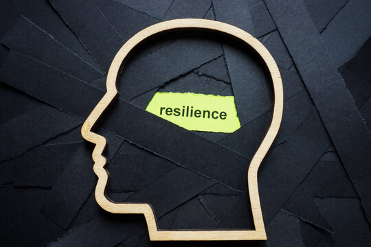Black stripes and the word resilience. Overcoming challenges.