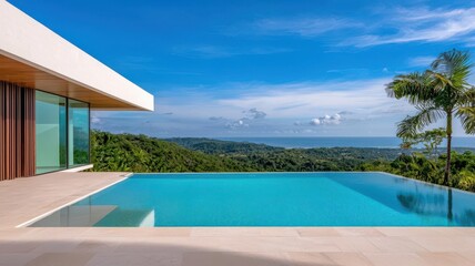 Fototapeta premium Modern hilltop mansion with infinity pool, overlooking the ocean and tropical greenery below luxury mansion, ocean view