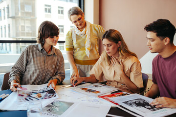 High school class project in a city setting with students working together on a creative...