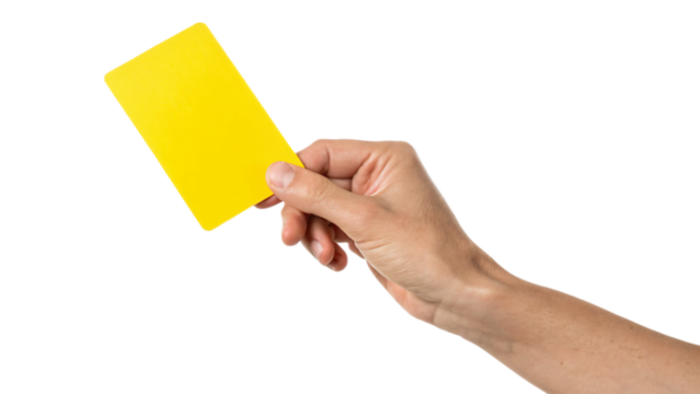 Hand holding blank yellow card