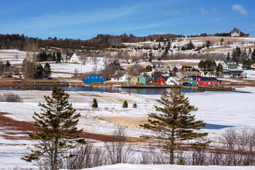 A view across a frozen river at the fishing community of French River, Prince Edward Island, Canada.