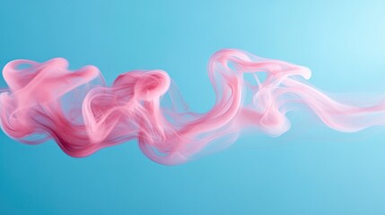 Delicate pink smoke gracefully swirls across a vibrant blue background, creating a soft and ethereal visual contrast.