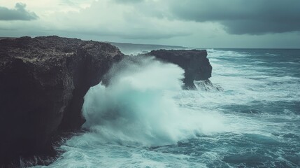 Waves crashing against cliffs along the shoreline