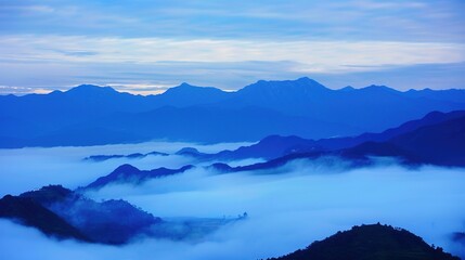 A Majestic View of Snow-Capped Mountains Emerging from a Sea of Clouds, Capturing the Essence of Natural Wonder and Serenity.