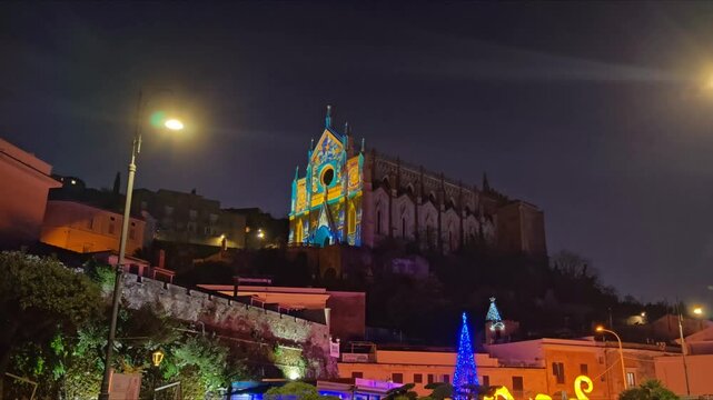 View of Gaeta cathedral with christmas lights at night in Lazio region, Italy