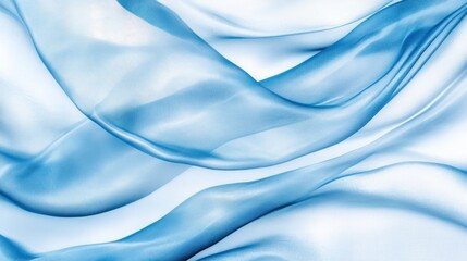 Fototapeta premium Close-up of flowing translucent blue fabric with soft waves and a smooth texture, creating a dreamy, elegant effect.