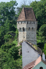 The Tin Coaters Tower from the Sighisoara citadel located in the heart of Transylvania, Romania. Central Sighisoara has preserved the features of a small medieval fortified city.