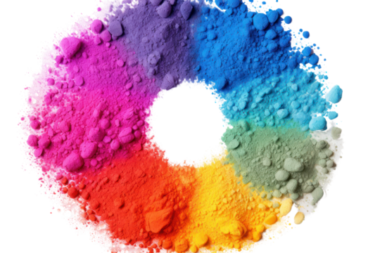 Close-up of different shades of Holi paint powders arranged in a circular pattern on a white background