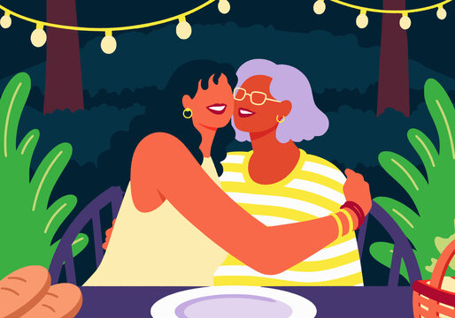 Happy female friends embracing and sitting in restaurant